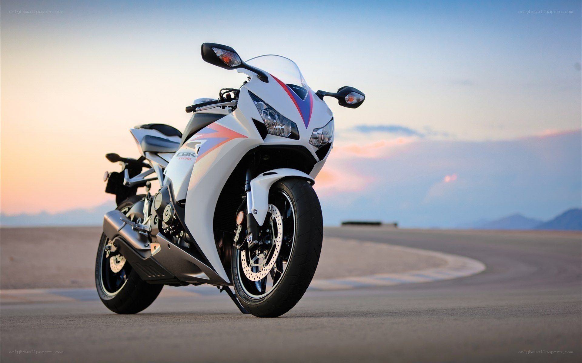 White sport motorcycle on track