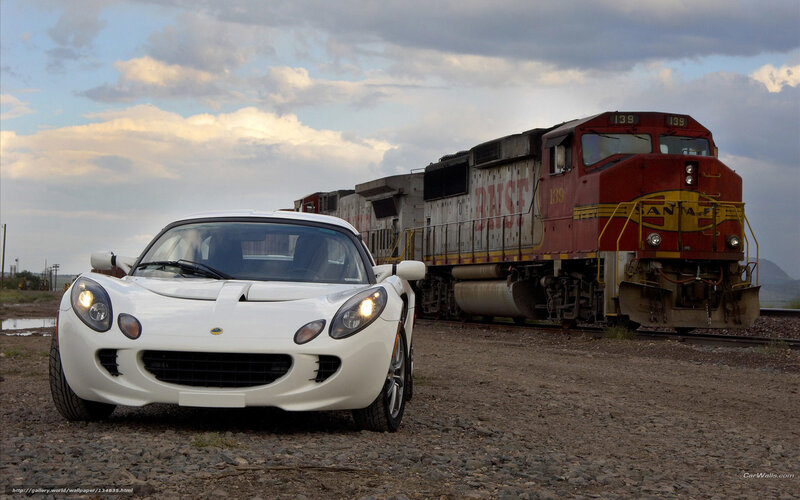 White sports car and train