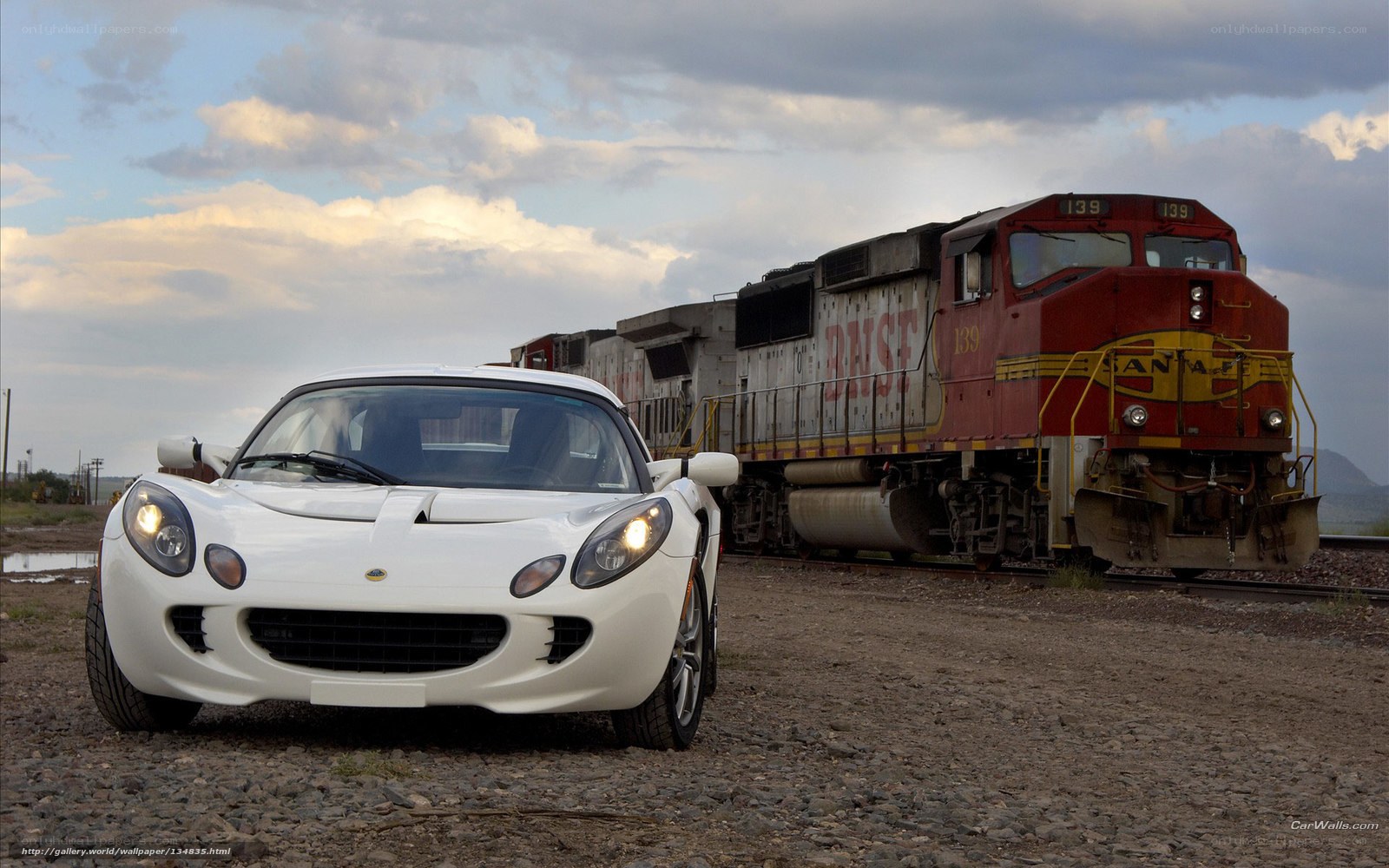White sports car and train