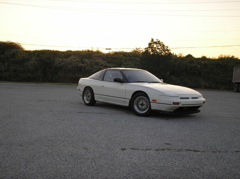 white sports car at dusk