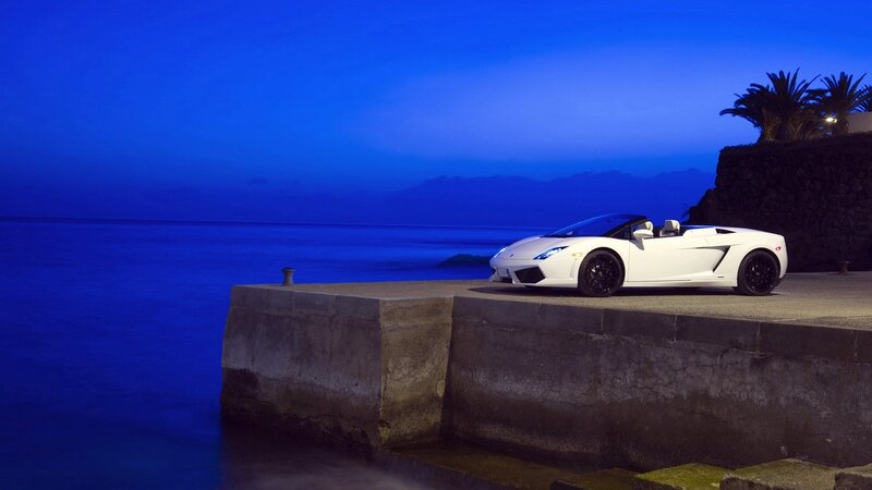 White sports car at dusk