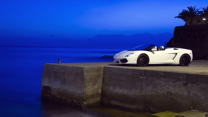 White sports car at dusk