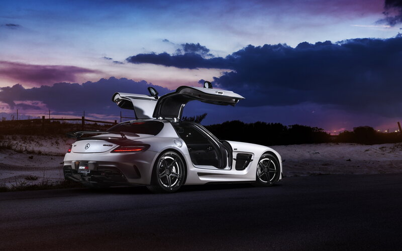 White sports car at dusk