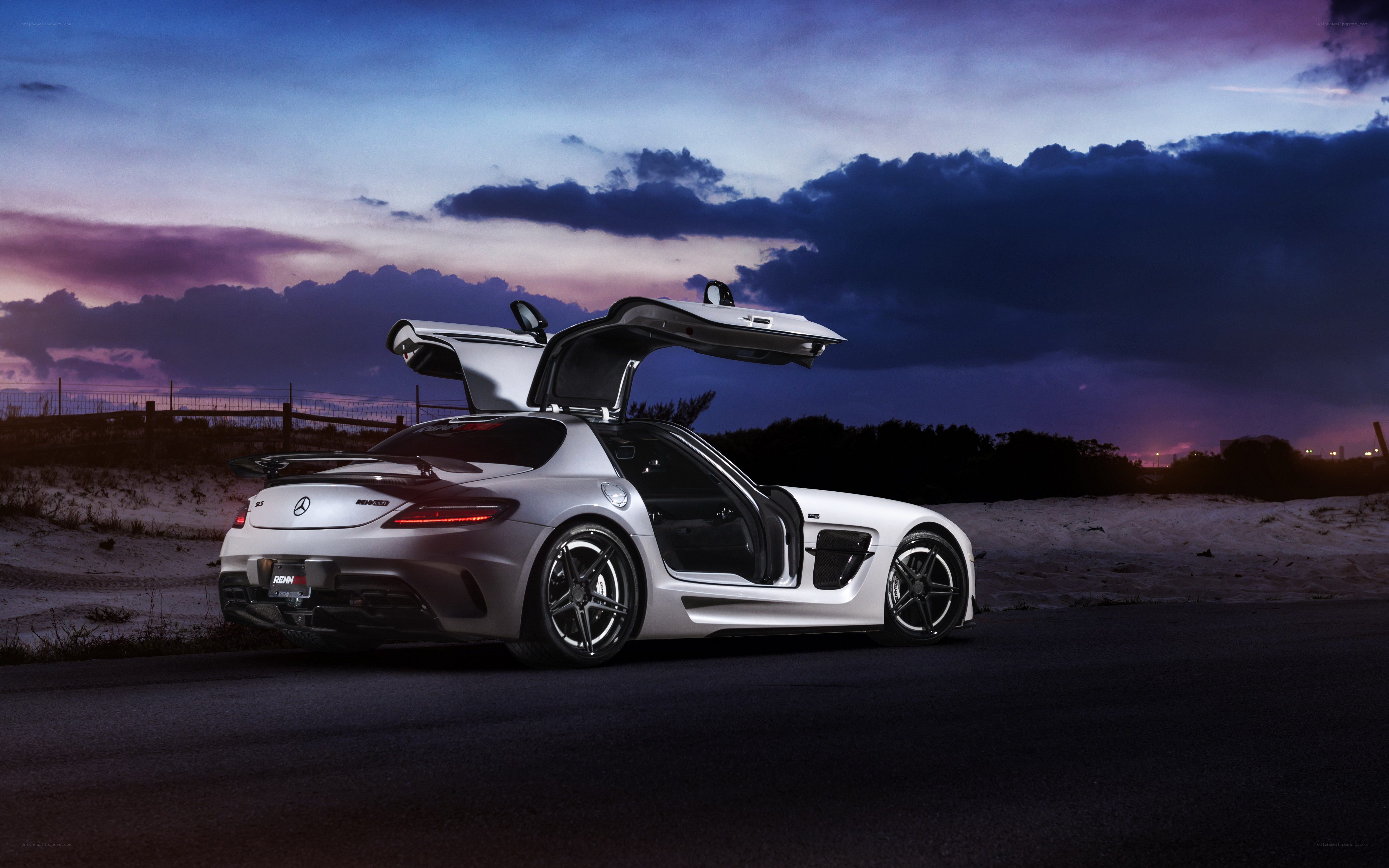 White sports car at dusk