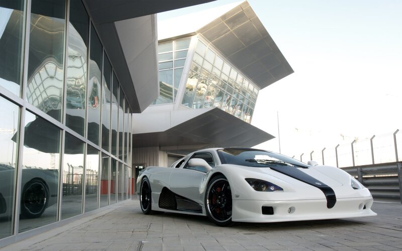 White sports car at modern building