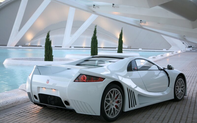 White sports car at modern building
