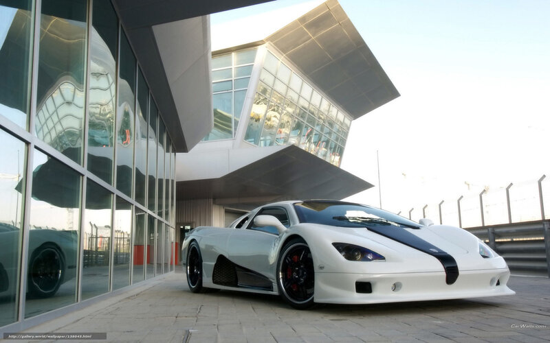 White sports car at modern building
