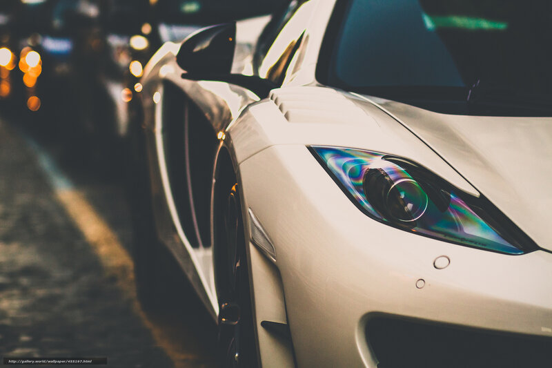 white sports car at night