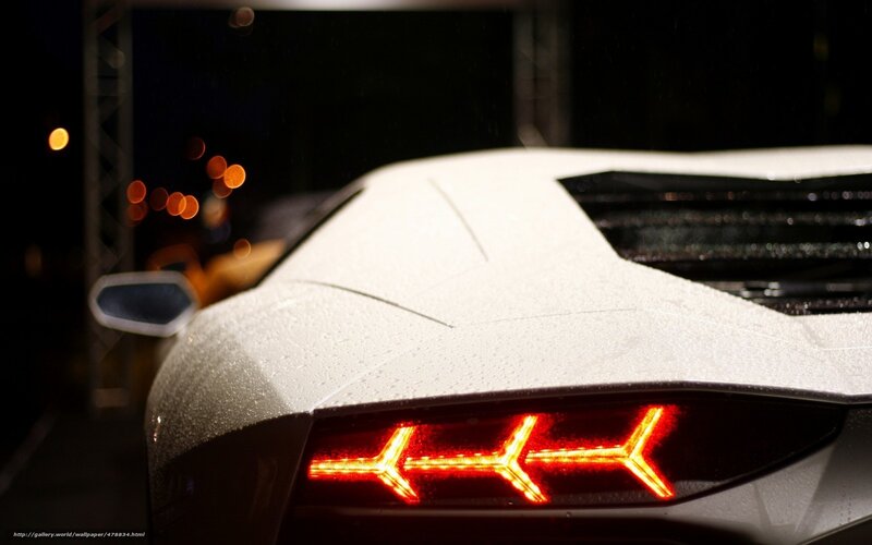 white sports car at night