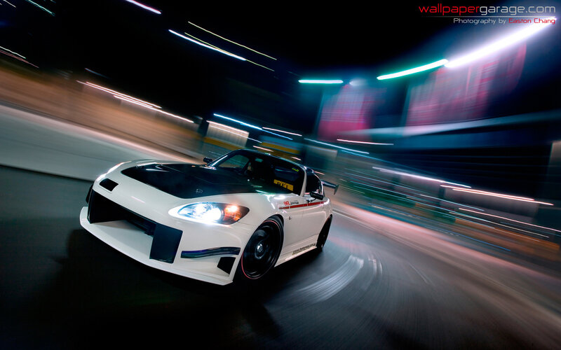 white sports car at night