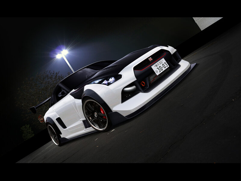 white sports car at night