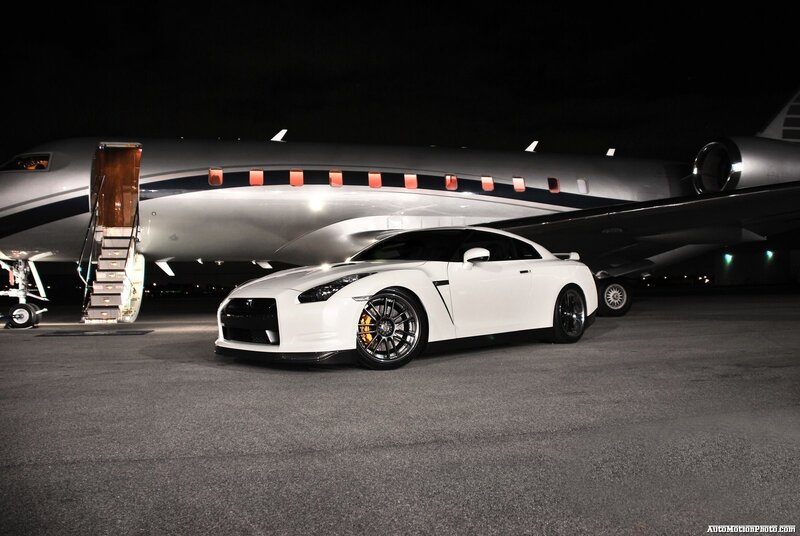 White sports car at night