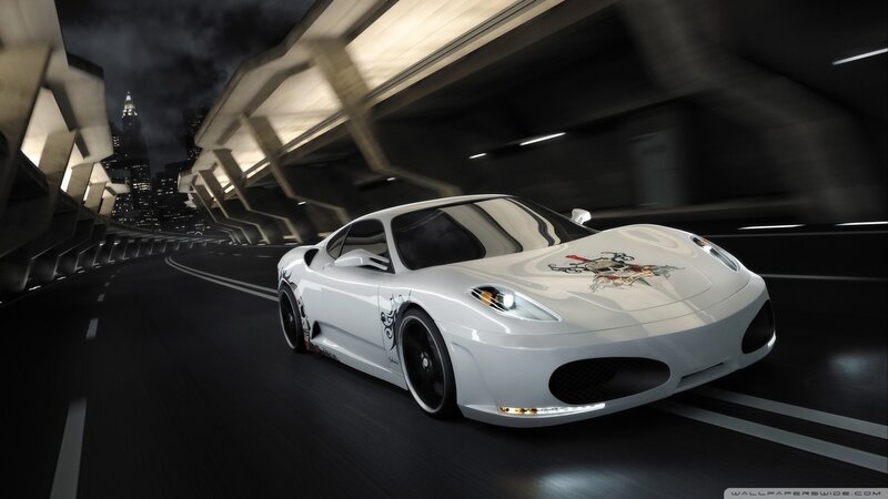 white sports car at night