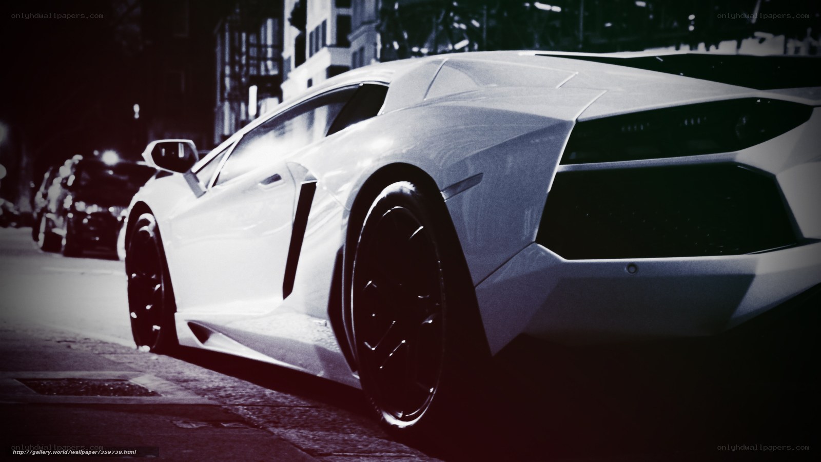 white sports car at night