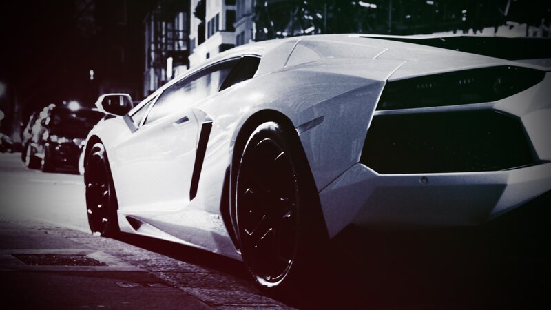 White sports car at night