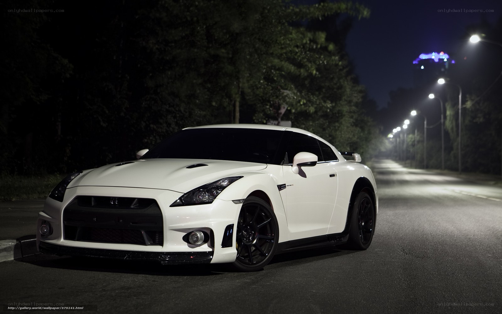 White sports car at night