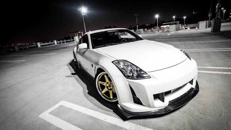 white sports car at night