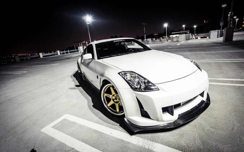white sports car at night