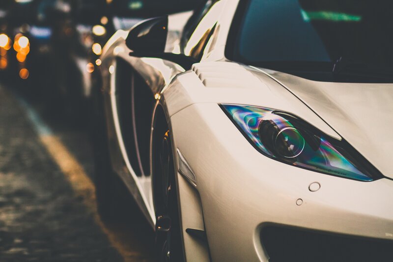 white sports car at night