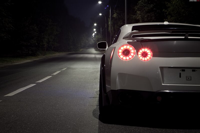 White sports car at night