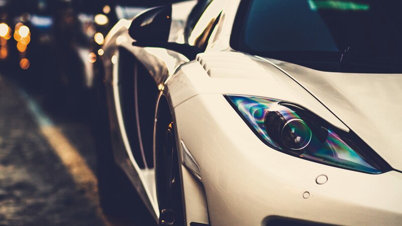 white sports car at night