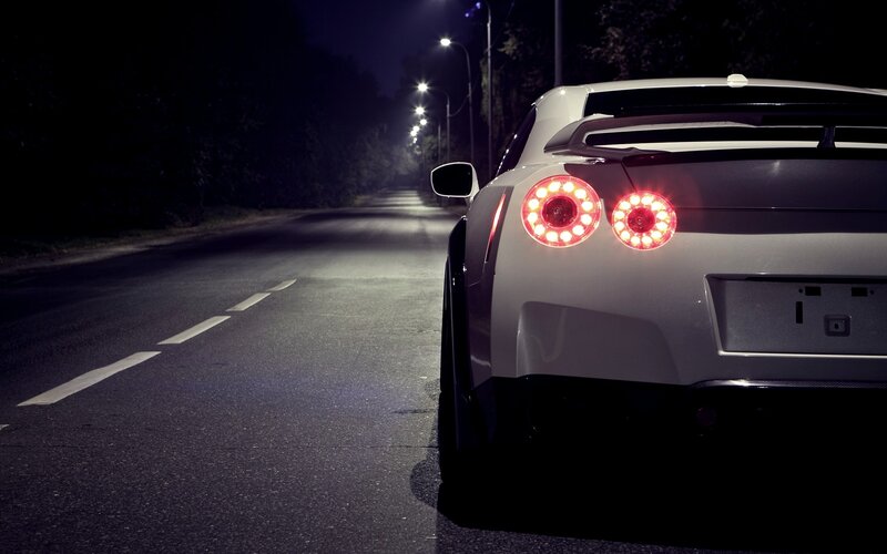 white sports car at night