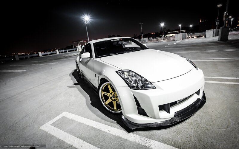 white sports car at night
