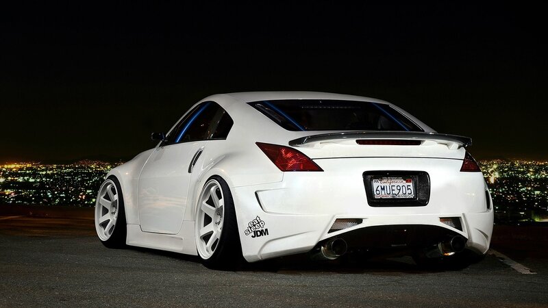 white sports car at night
