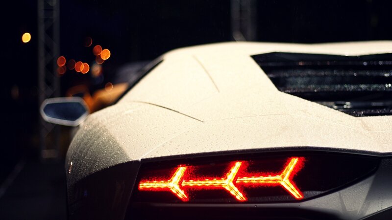 white sports car at night
