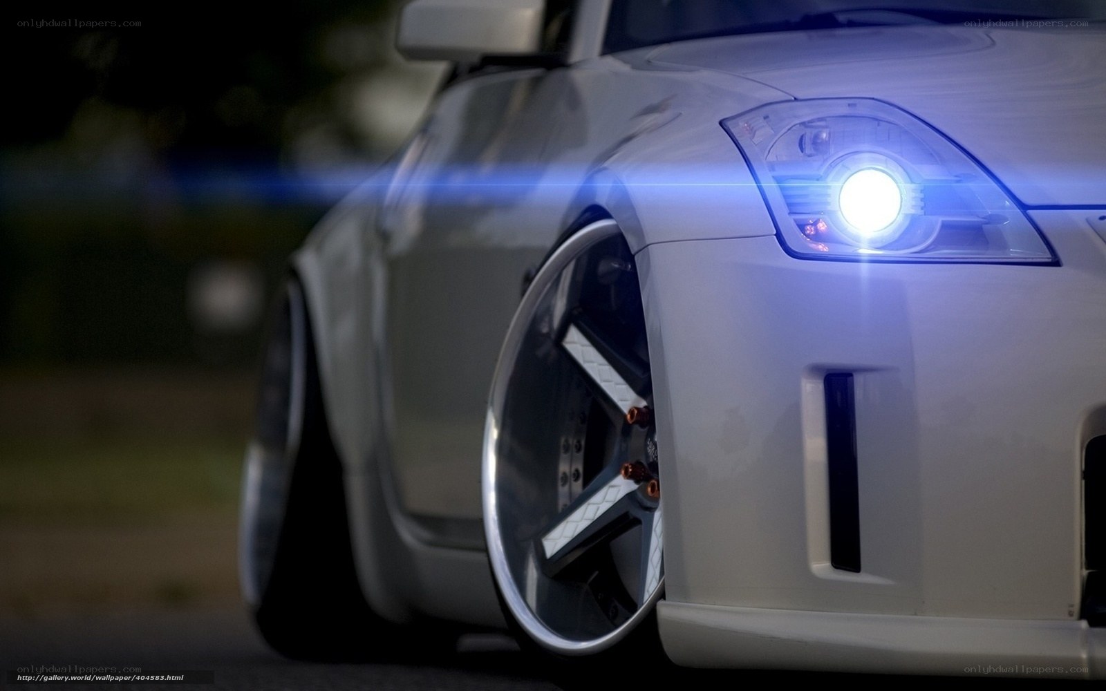 white sports car at night