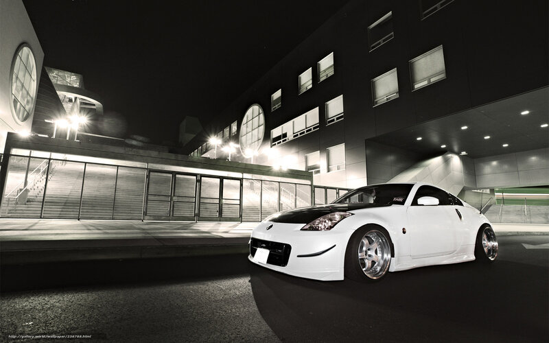 White sports car at night