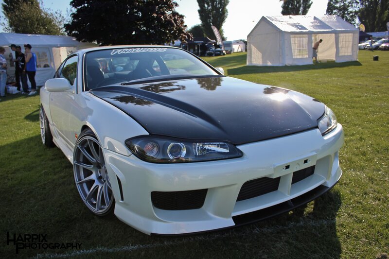 white sports car at outdoor event