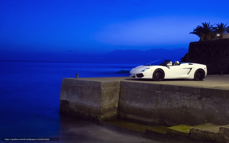 White sports car at seaside