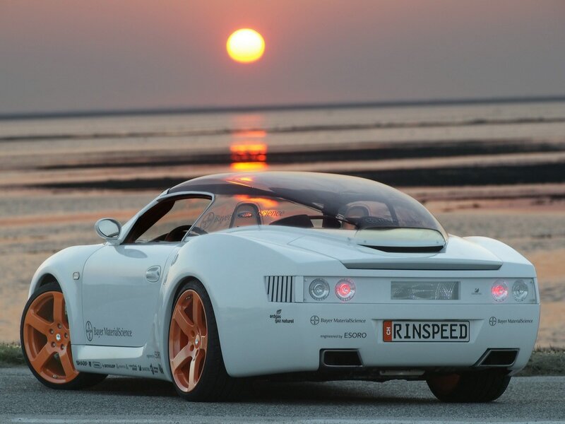 White sports car at sunset
