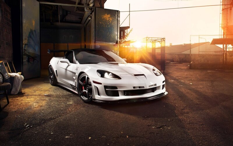 White sports car at sunset