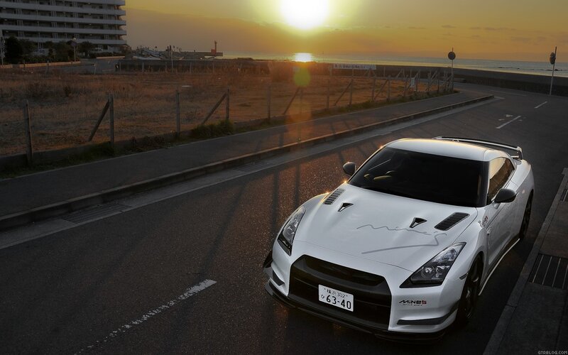 White sports car at sunset
