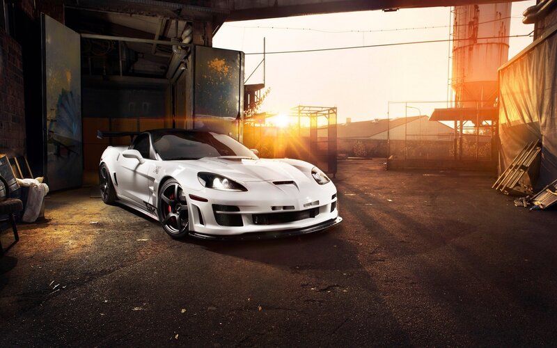 White sports car at sunset