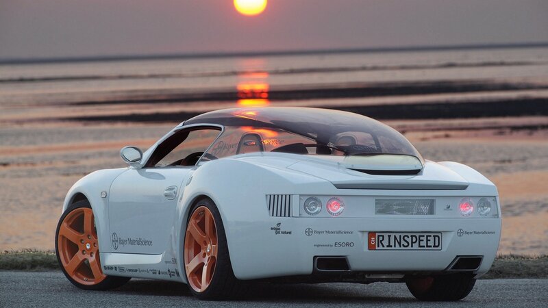 White sports car at sunset