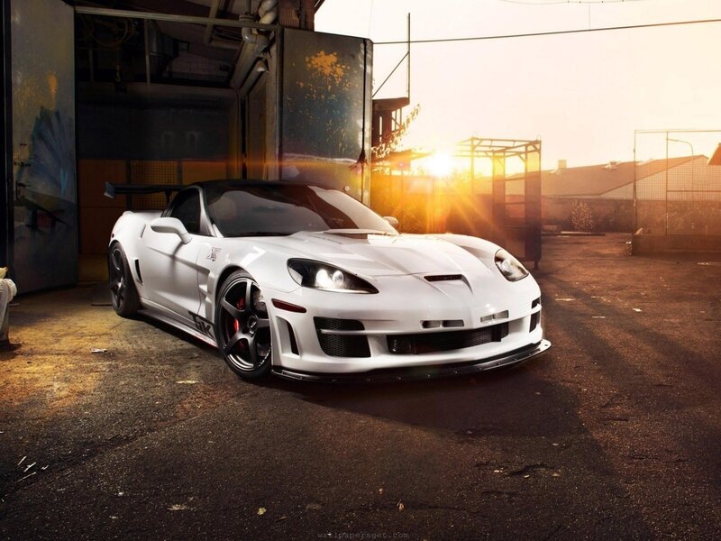 White sports car at sunset