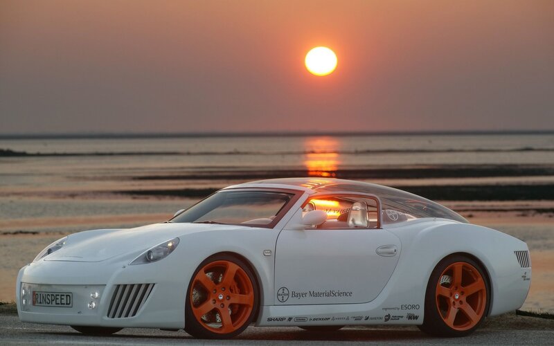 White sports car at sunset