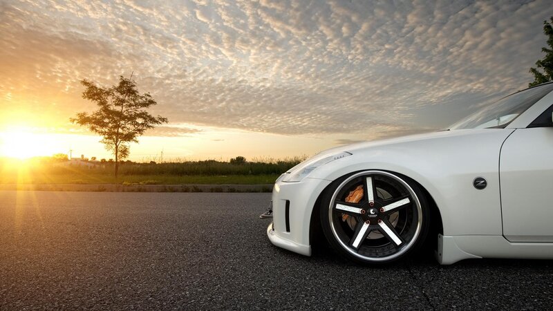 White sports car at sunset