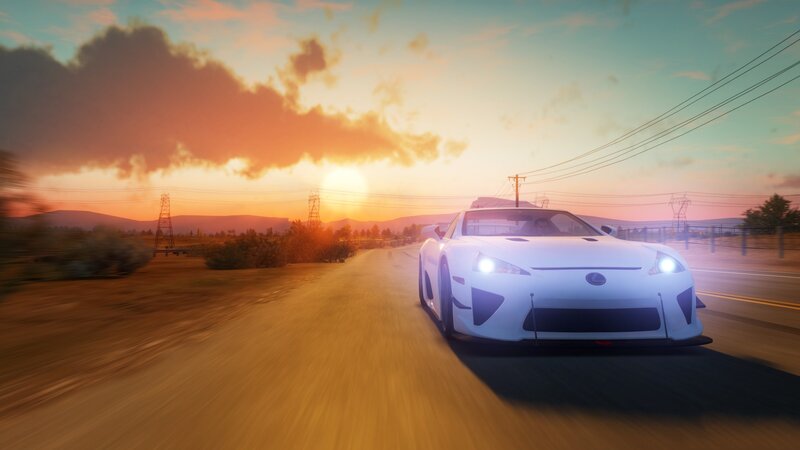 White sports car at sunset