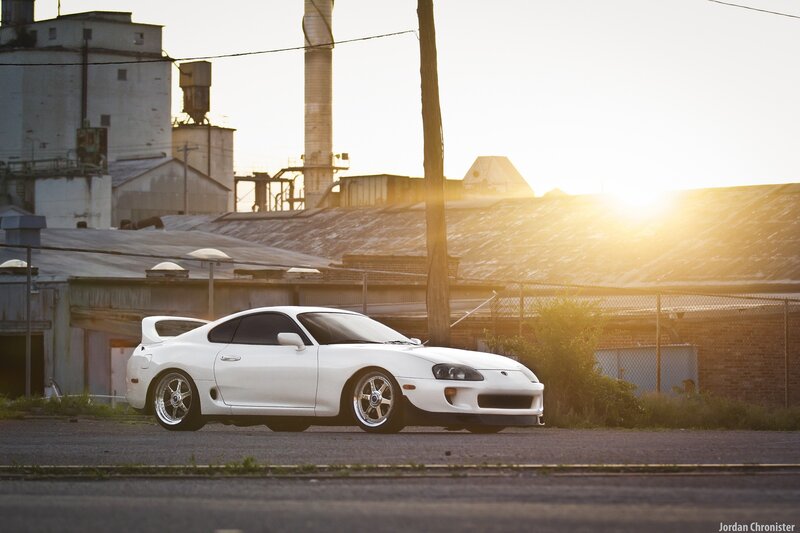 White sports car at sunset