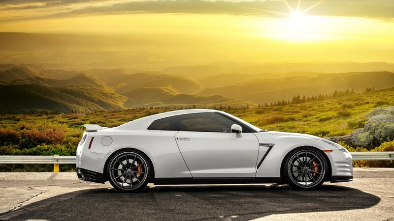 White sports car at sunset