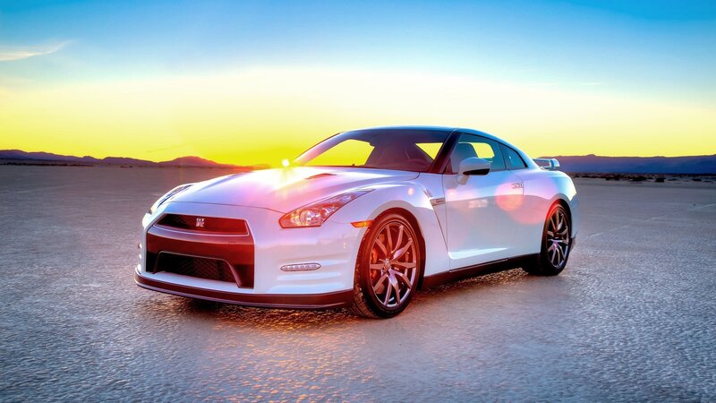White sports car at sunset