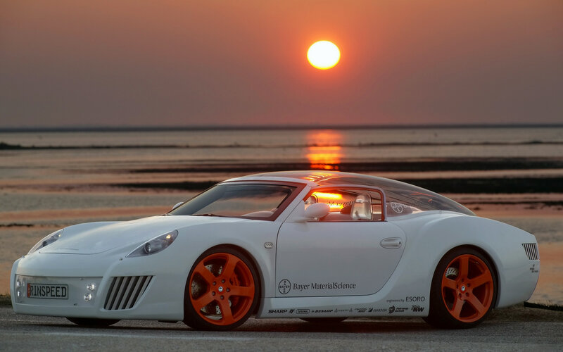 white sports car at sunset