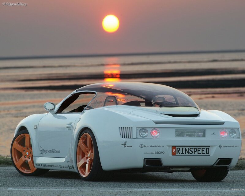 White sports car at sunset