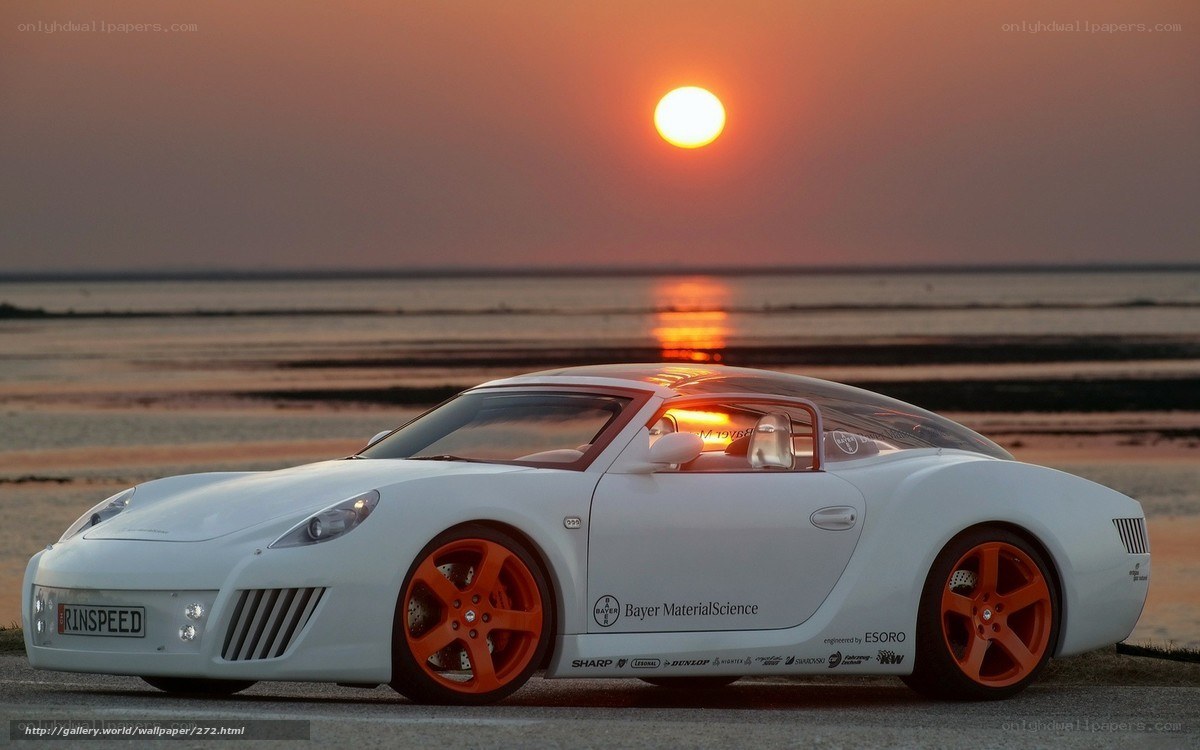 White sports car at sunset