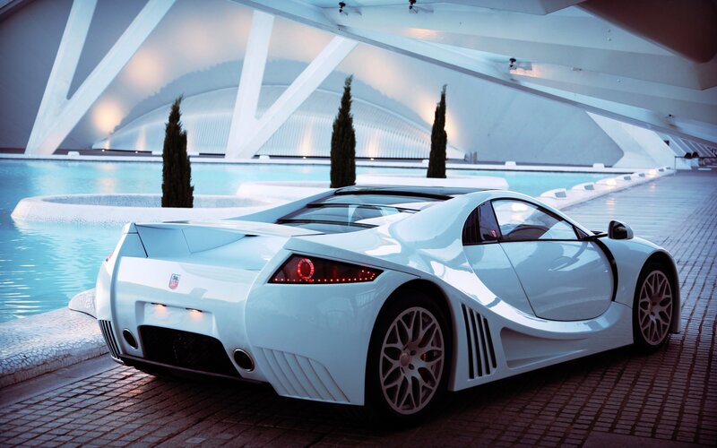 White sports car by pool