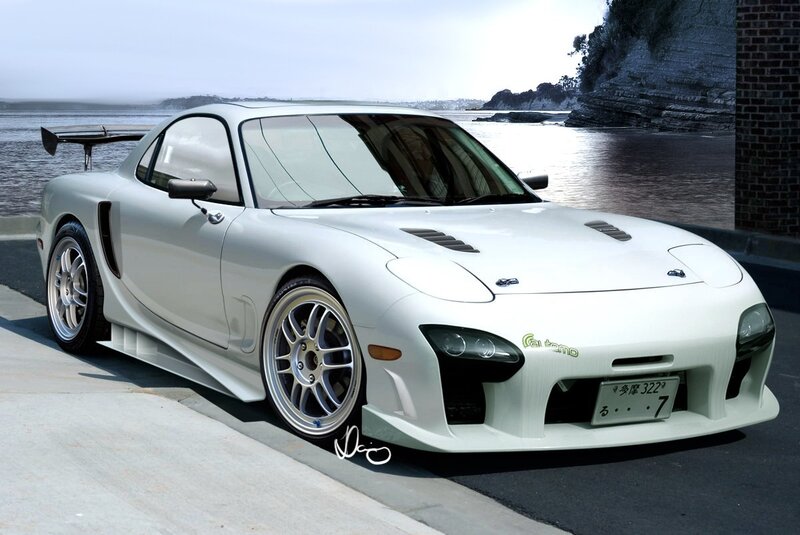 white sports car by the coast
